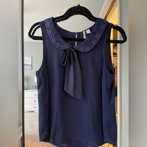 Blue sleeveless blouse